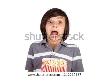 Similar – kleiner Junge Kind mit Popcorn auf blauem Hintergrund