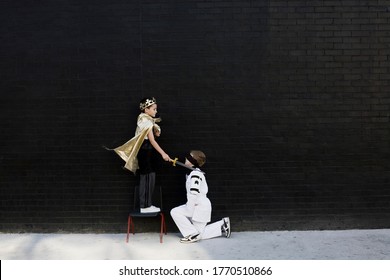 Portrait Of Little Boys Playing Accolade