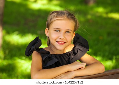 Portrait Of A Little Girl Before School Age, Summer Park Outdoors