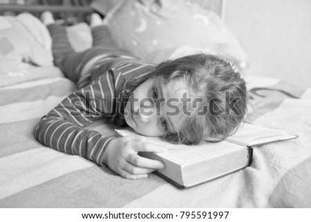 Similar – young caucasian little boy playing with tablet on couch