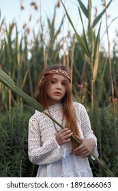 Portrait Of A Little Girl In Ethnic Eastern European Clothes