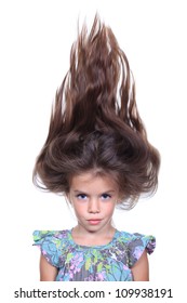 portrait of little girl with extravagant hair on his head