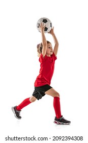 Portrait Of Little Girl, Football Player Training, Throwing Ball Isolated Over White Background. Competition. Concept Of Action, Sportive Lifestyle, Team Game, Health, Energy, Vitality And Ad