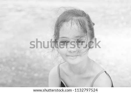 Similar – On the road in Venice. A girl stands on a bridge.