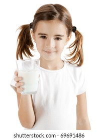 Portrait Of A Little Girl Holding A Cup Of Milk, Isolated On White