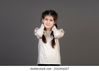 Portrait Of Little Girl Massaging Painful Back, Feel Discomfort In Neck, Child Sedentary Lifestyle.