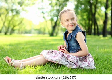 Portrait Little Girl Sitting On Grass Stock Photo 82065370 | Shutterstock