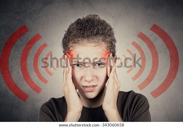 Portrait Little Girl Suffering Headache Holding Stock Photo