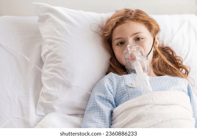 Portrait of little girl suffering from pneumonia lying in hospital bed with oxygen mask. Teenage kid patient with asphyxia breath in oxygen mask sleeping in bed at ward. Oxygen face mask of cute girl - Shutterstock ID 2360886233