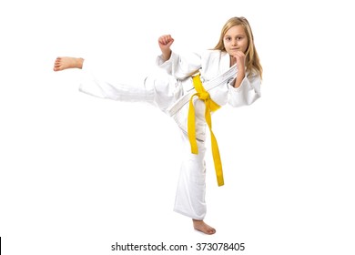 Portrait of little girl training ashihara martial art  isolated on white background - Powered by Shutterstock