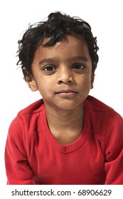 portrait of little Indian boy on a white background