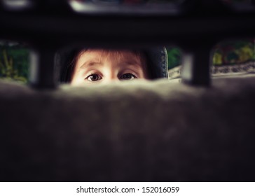 Portrait of a little kid in the car