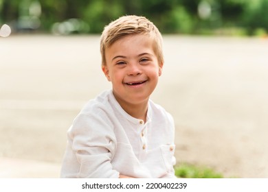 A Portrait of a little schoolboy with down syndrome - Powered by Shutterstock