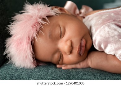 Portrait of little sleeping African-American baby