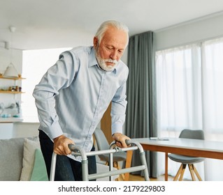 Portrait of a lonely senior man using walker assistanece  at home or nursing home - Powered by Shutterstock