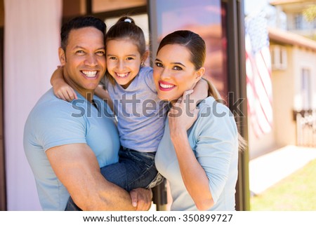 portrait of lovely american family in their home