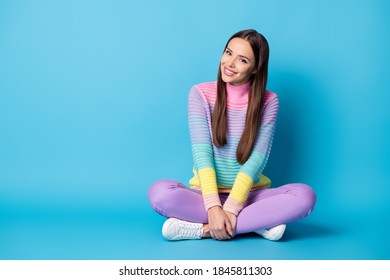 Portrait Of Lovely Cheerful Girl Sitting Lotus Position Crossed Legs Free Time Isolated Over Vibrant Blue Color Background