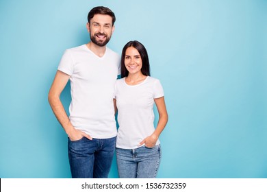 Portrait Of Lovely Enthusiastic Man And Woman Have Fun Hug Wear Good Look White Outfit Isolated Over Blue Color Background