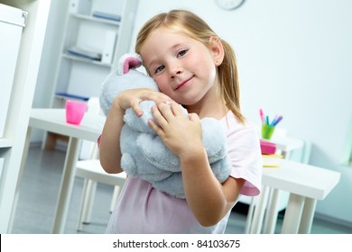 Portrait Of Lovely Girl With Her Favourite Teddy Bear