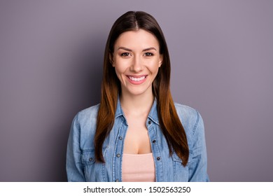 Portrait of lovely positive cheerful lady have fun free time listen look have fun with her friends wear denim jeans shirt isolated over gray color background