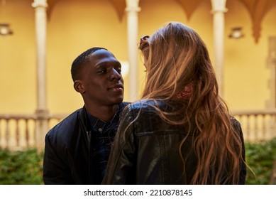 Portrait Of Loving Boyfriend Looking At His Blonde Girlfriend.