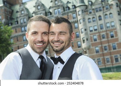 Portrait Of A Loving Gay Male Couple On Their Wedding Day.