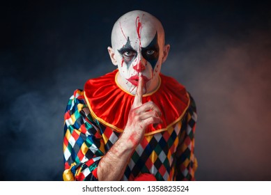 Portrait Of Mad Bloody Clown Shows The Quiet Sign