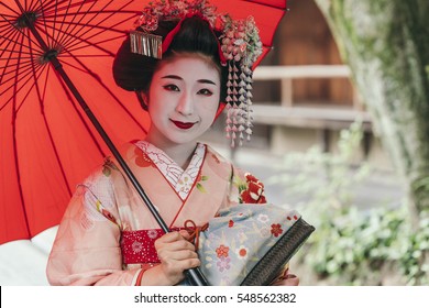 Portrait Of  A Maiko Geisha In Gion Kyoto