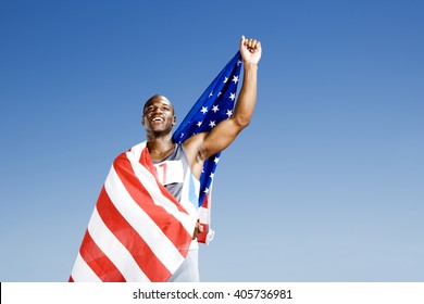 Portrait of a male athlete with US flag - Powered by Shutterstock