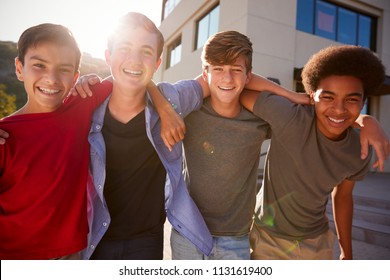 Portrait Of Male High School Student Friends Outside College Buildings