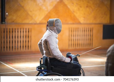 Portrait Of Male Paralympic Wheelchair Fencer. Sport Concept