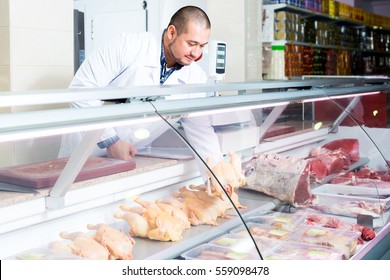 Portrait Of Male Seller In Halal Section At Supermarket