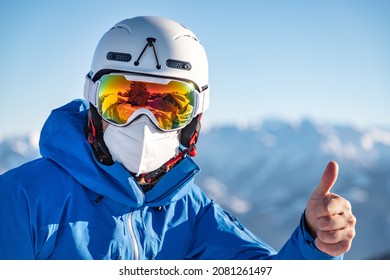 Portrait of a male skier wearing a FFP2 mask