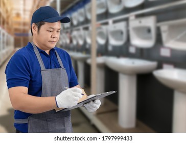 Portrait of male staff warehouse operator with Blurred the background of equipment tool for technician or worker on product shelf in Construction material store