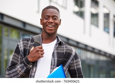 Portrait Of Male Student Standing Outside College Building