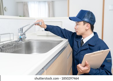 Portrait Of A Male Water Supplier
