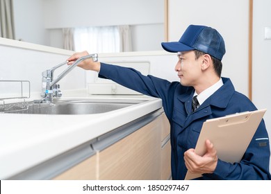 Portrait Of A Male Water Supplier
