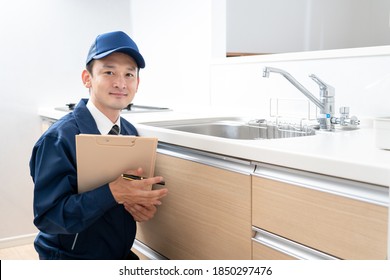 Portrait Of A Male Water Supplier
