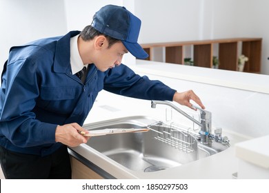 Portrait Of A Male Water Supplier
