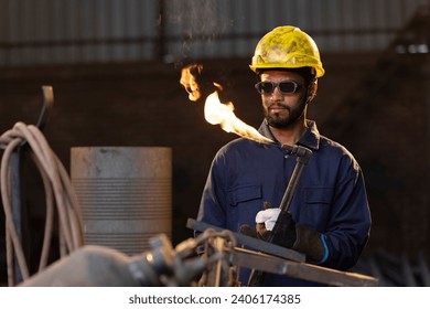 Portrait of Male welder working at factory  - Powered by Shutterstock