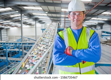 Portrait Of Male Worker In Waste Recycling Plant