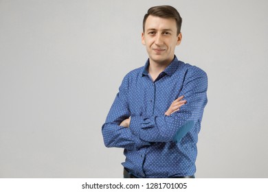 Portrait of a man in business clothes with folded hands on a white background - Shutterstock ID 1281701005