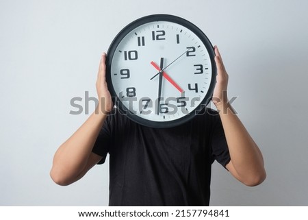portrait of man with clock face