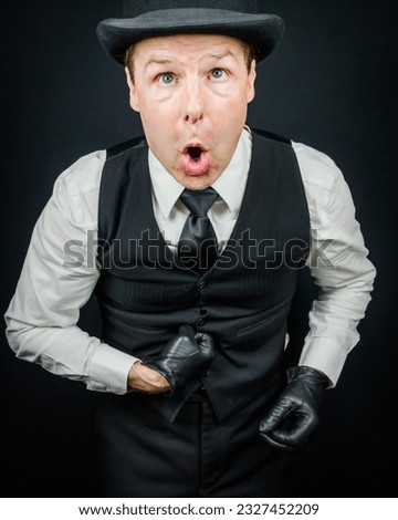 Portrait of Man Comically Punching Himself in the Stomach. Vintage Boxer or Thuggish Ruffian. Oof Concept.
