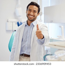 Portrait, man and dentist with thumbs up, smile and oral care with happiness, specialist and professional. Face, male person or employee with dental hygiene, healthcare sector and support with review - Powered by Shutterstock