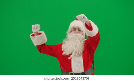 Portrait of man dressed as Santa on chroma key green screen background. Santa Claus in red suit dancing funny. - Powered by Shutterstock