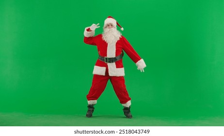 Portrait of man dressed as Santa on chroma key green screen background. Santa Claus in red suit dancing funny. - Powered by Shutterstock