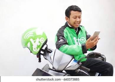 Portrait Man Driver Transportation Motorcycle Gojek, Grab, Uber Touch Mobile For Order
