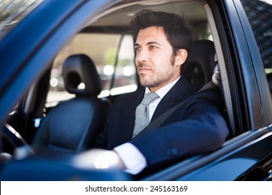 Portrait Of A Man Driving A Car