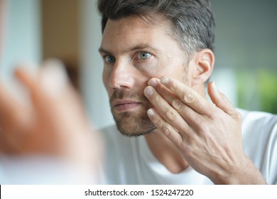 Portrait Of A Man In Front Of Mirror 